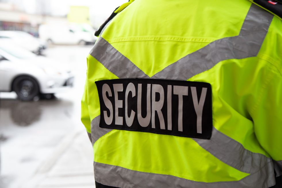 Security guard with reflective vest