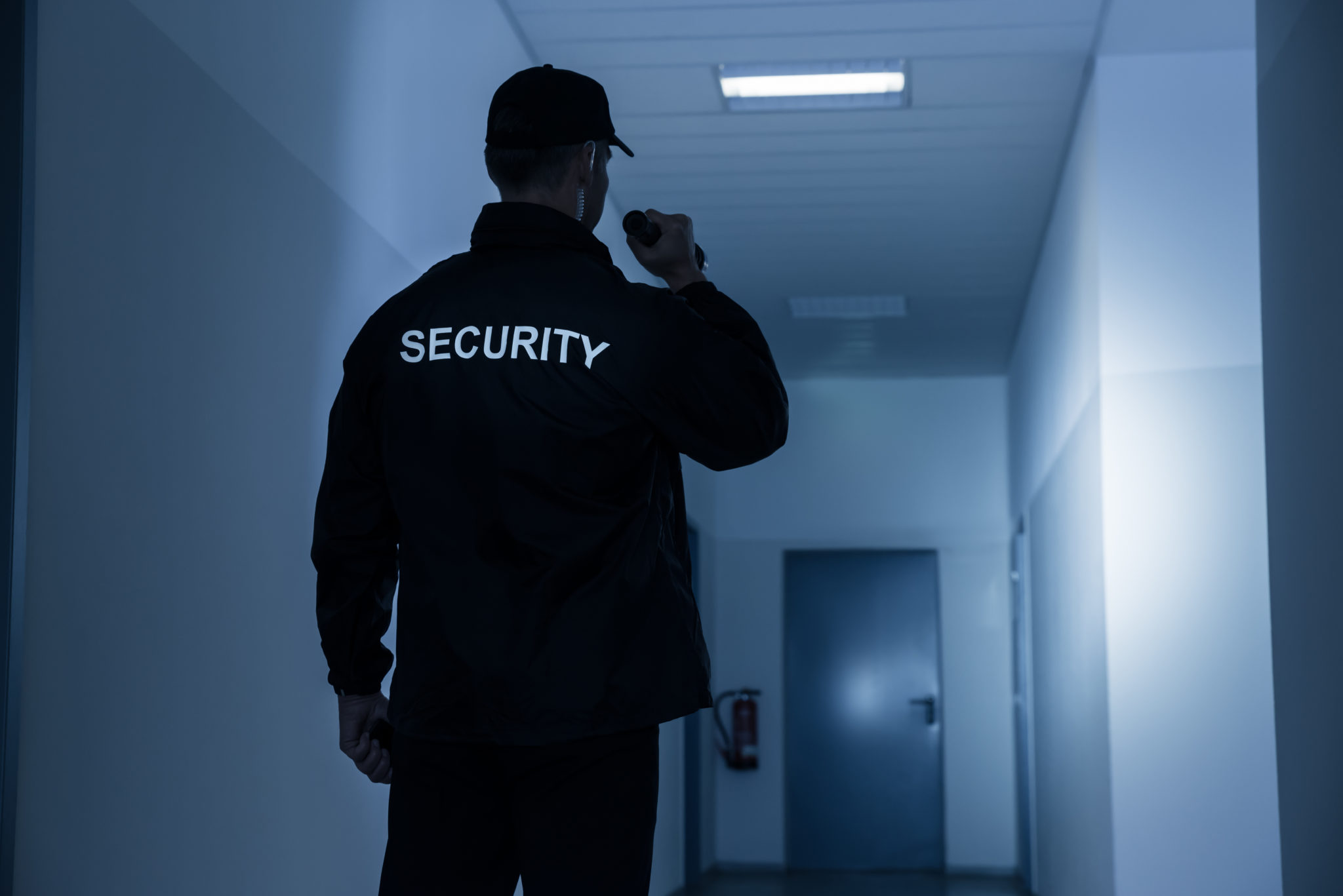 Security guard patrolling a building